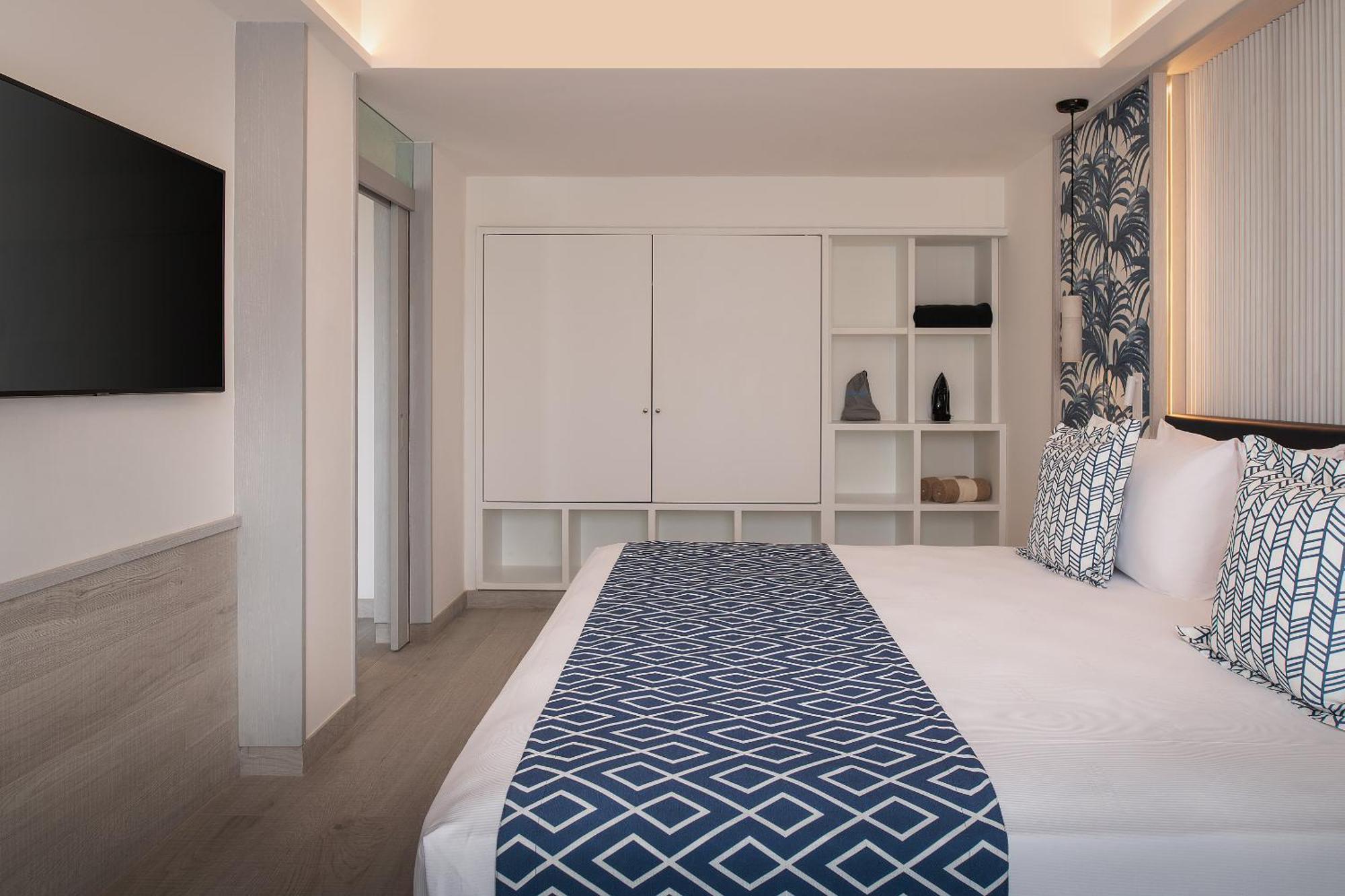 Catalonia Grand Costa Mujeres All Suites & Spa Канкун Номер фото A bedroom at the hotel